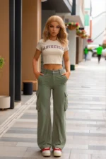 best real doll streetwear portrait with blonde hair and blue eyes on a modern city walkway