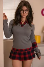 sex doll bbw wearing glasses, knit sweater, and plaid skirt in a cozy modern bedroom lifestyle setting