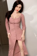 asiansex doll in pink fitted dress with soft indoor portrait lighting and elegant pose