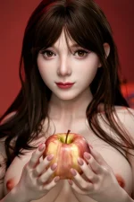 big boobs sex doll holding red yellow apple in front of deep red background close portrait